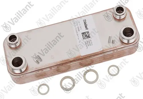 Vaillant Wärmetauscher mit mehreren Anschlüssen und Dichtungen, auf einer Oberfläche liegend, mit sichtbaren Markenkennzeichnungen.